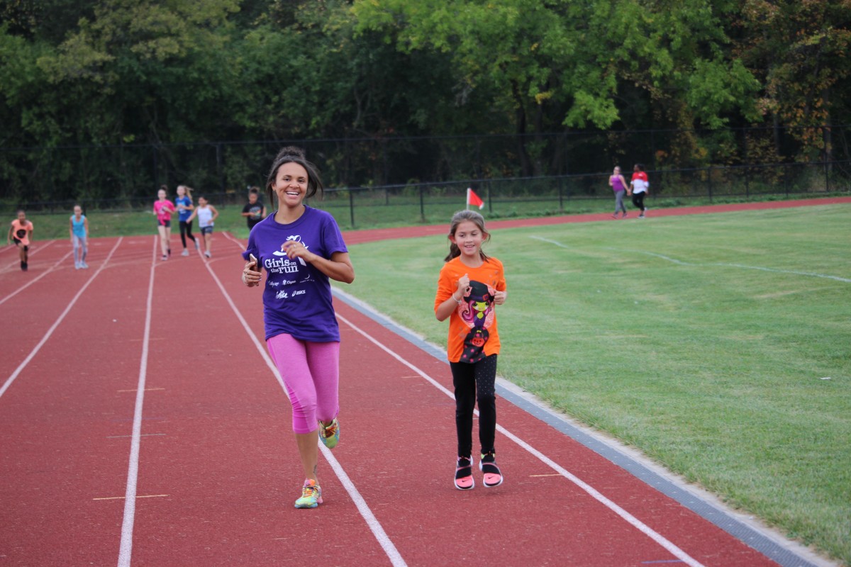 Girls running on track 4