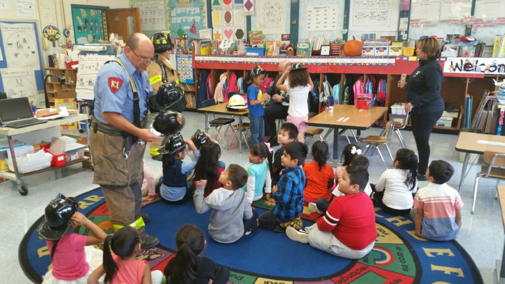 Firefighter talking to students in classroom 1