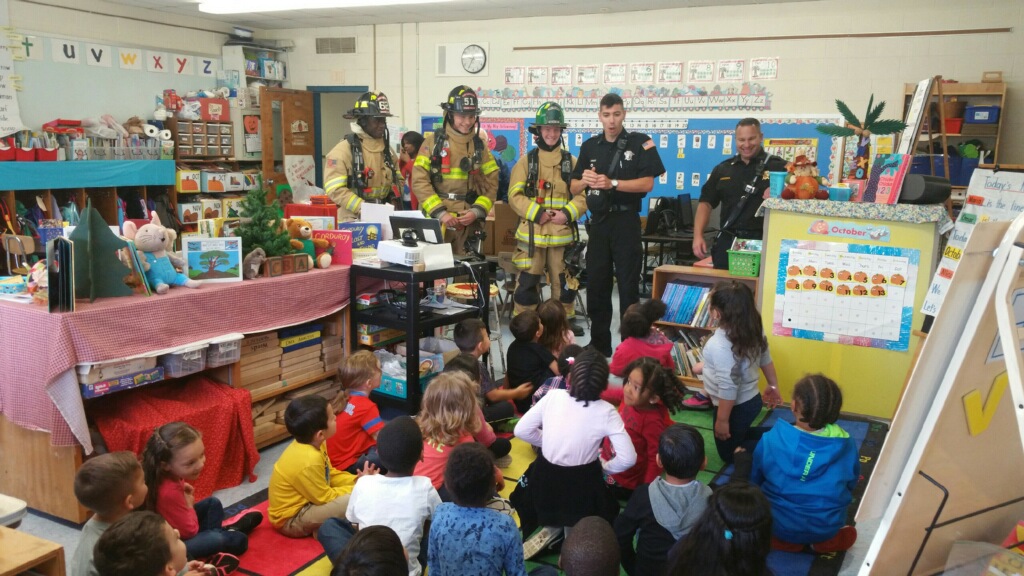 Firefighter talking to students in classroom 2