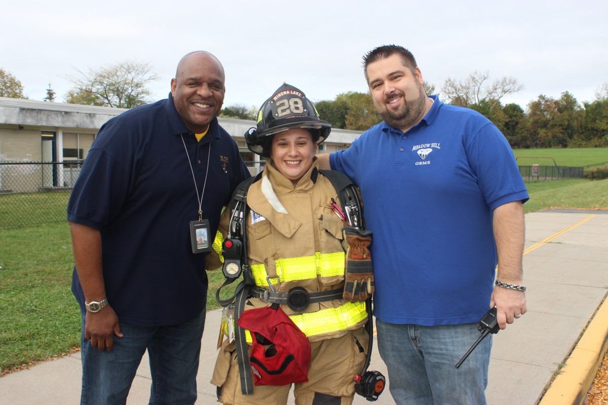 Administrators with firefighter