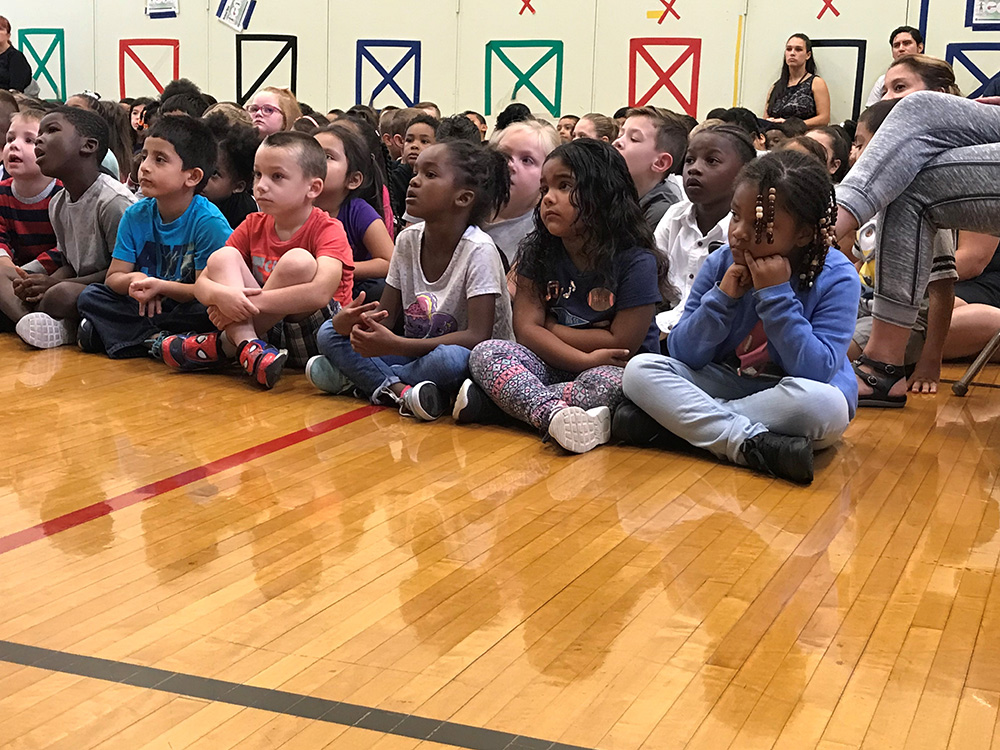 Students listening to the author's presentation.