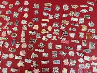 Table filled with stickers.