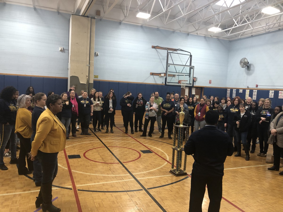 Assistant Superintendent of Human Resources, Mr. Michael McLymore addresses the group before handing out the trophy.