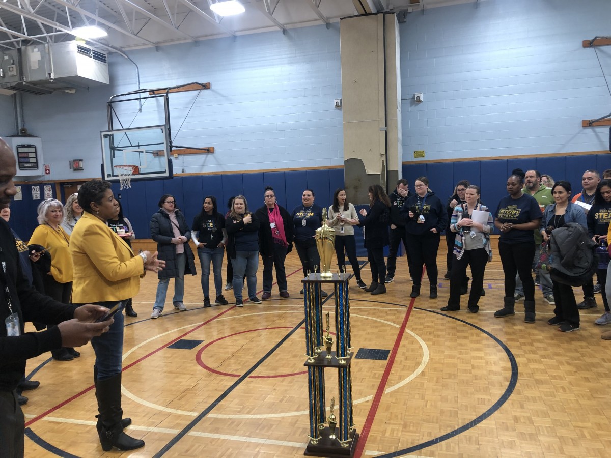 Building principal Mrs. Ciria Briscoe-Perez addresses the group.