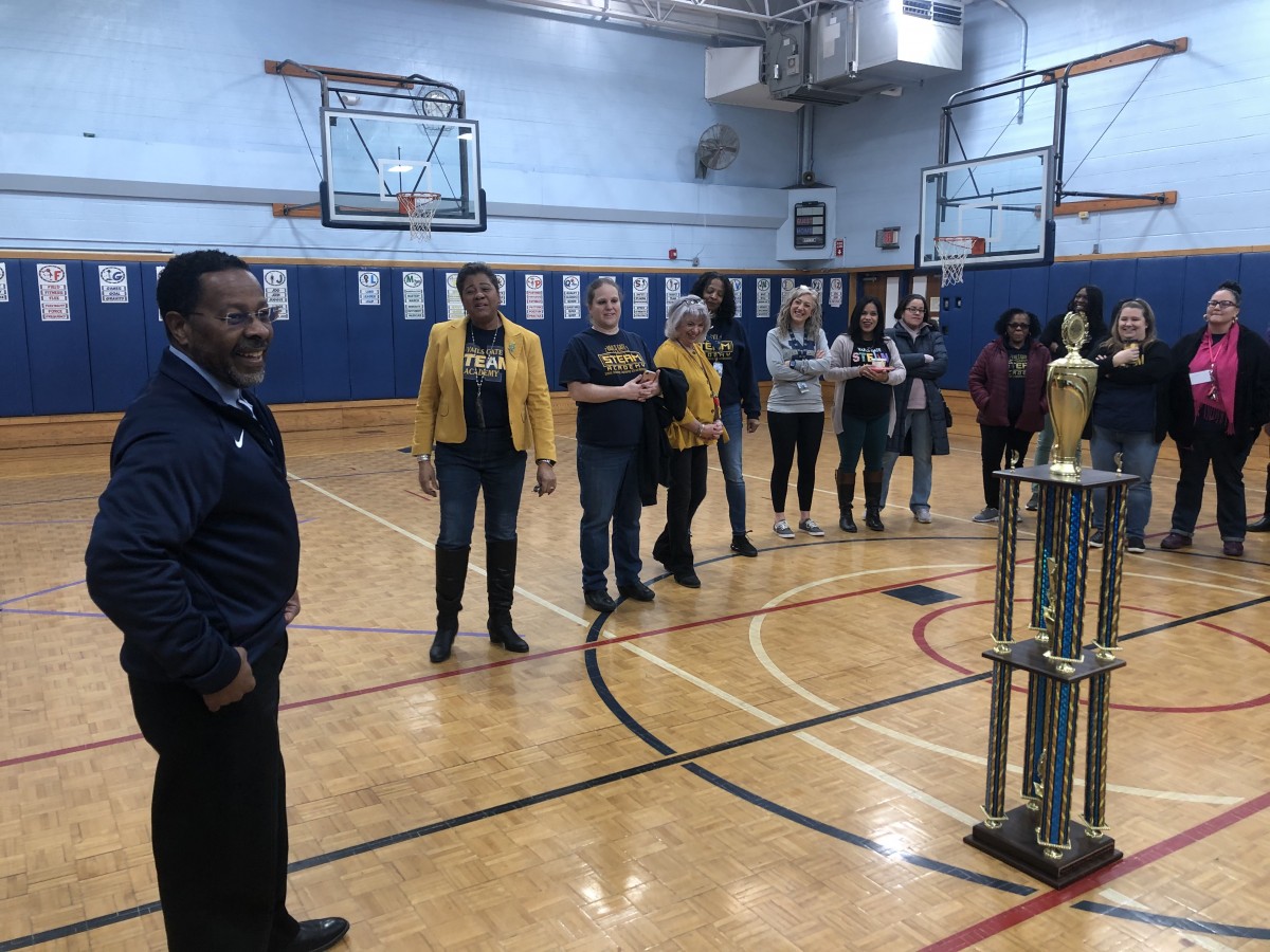 Assistant Superintendent of Human Resources, Mr. Michael McLymore addresses the group before handing out the trophy.